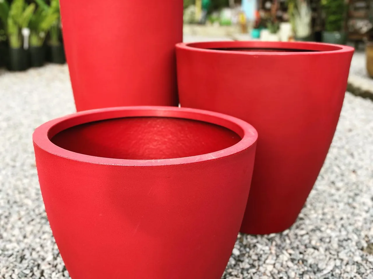 Vasos vietnamitas vermelhos de acabamento brilhante